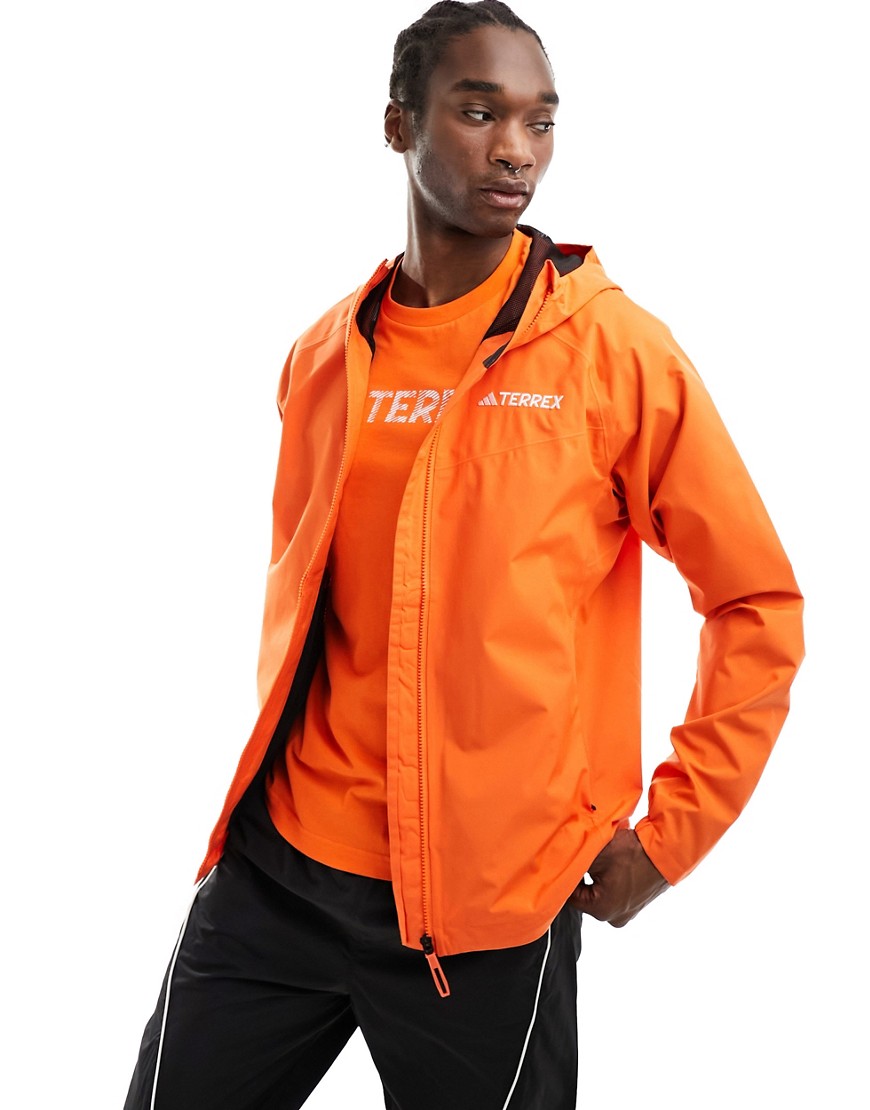 adidas Terrex outdoors waterproof jacket in orange