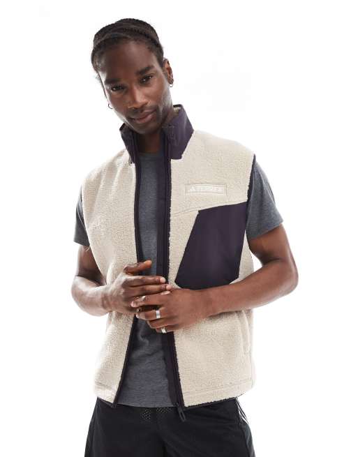 adidas - Terrex - Uniseks bodywarmer van teddy fleece in beige