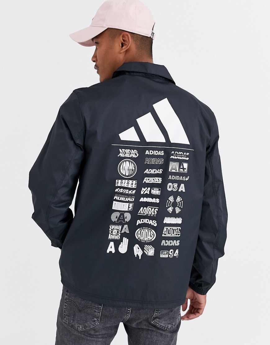 Adidas 'the pack' back print coach jacket in black