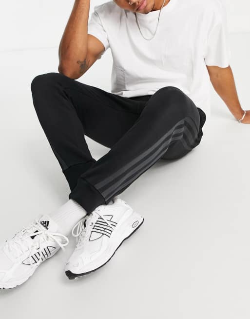 Black adidas pants with best sale grey stripes