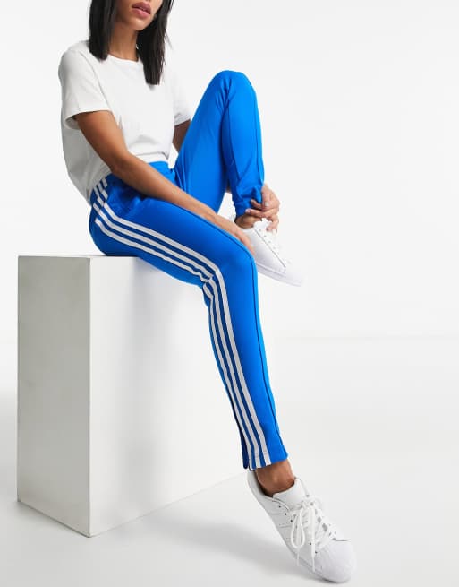 adidas track pants in blue