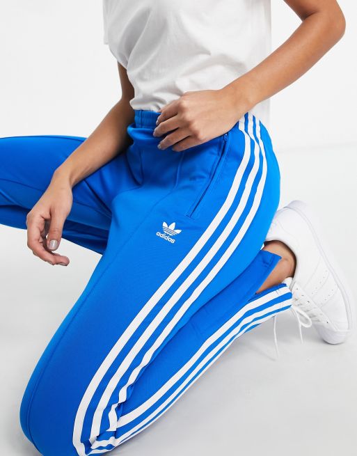 Blue adidas tracksuit bottoms women's new arrivals