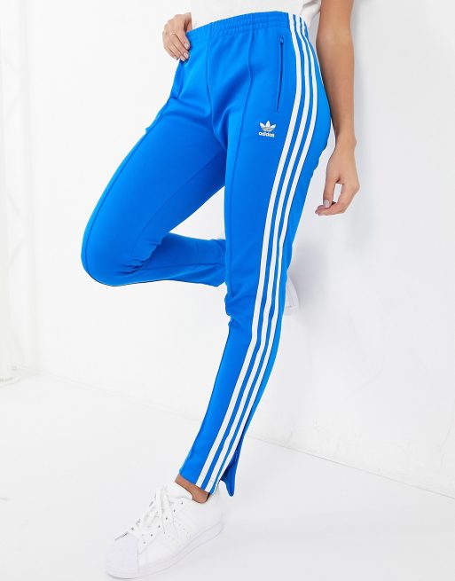 adidas track pants in blue