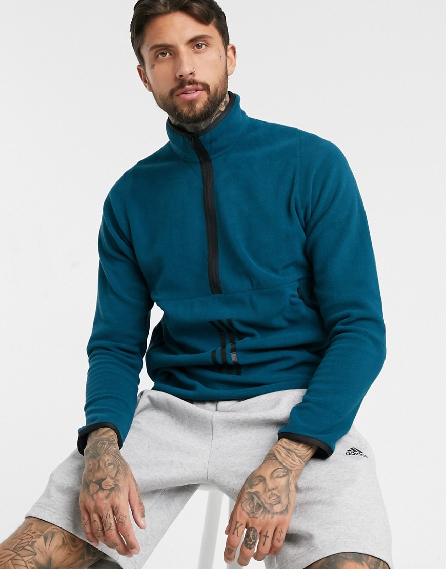 Adidas Training 1/4 zip sweatshirt with three stripes in teal-Blue