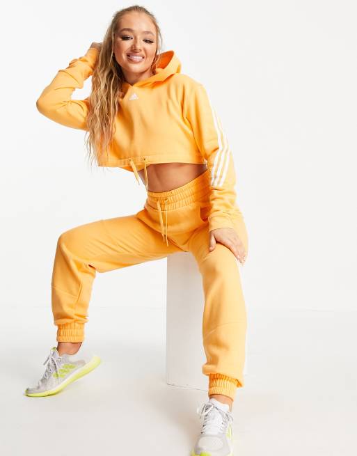 adidas Training 3 stripe cropped hoodie in hazy orange