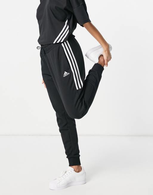 Adidas black best sale three stripe joggers