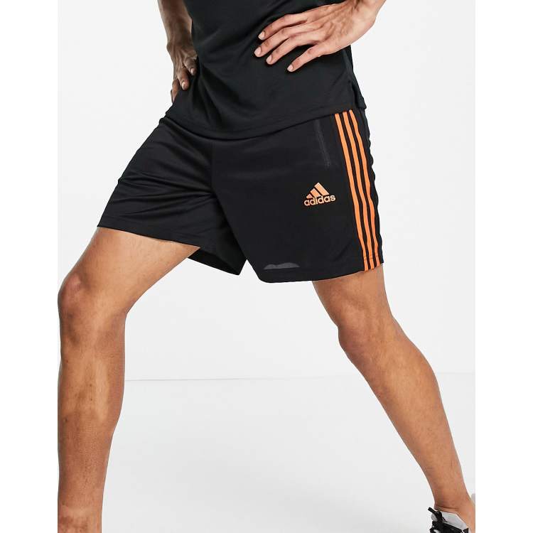 Adidas black hot sale orange stripes