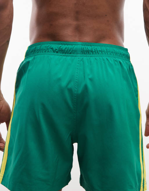 adidas Training 5in swimshorts in green, red and yellow, 5 of 5
