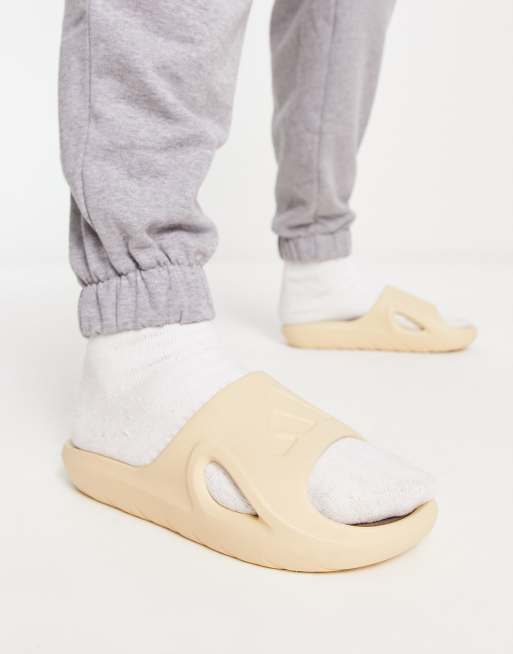 adidas Training Adicane slides in neutral sand