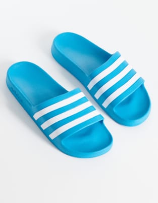 adidas Training Adilette Aqua sliders in blue and white