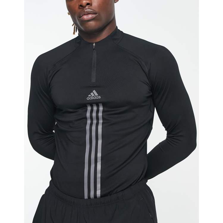 adidas Training Alpha Strength 3 stripe 1/4 zip sweat in black | ASOS