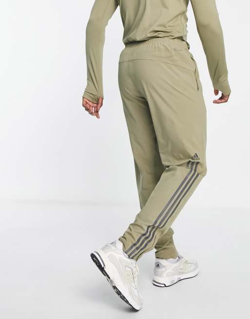adidas Training Alpha Strength 3 stripe 1/4 zip sweat in khaki | ASOS