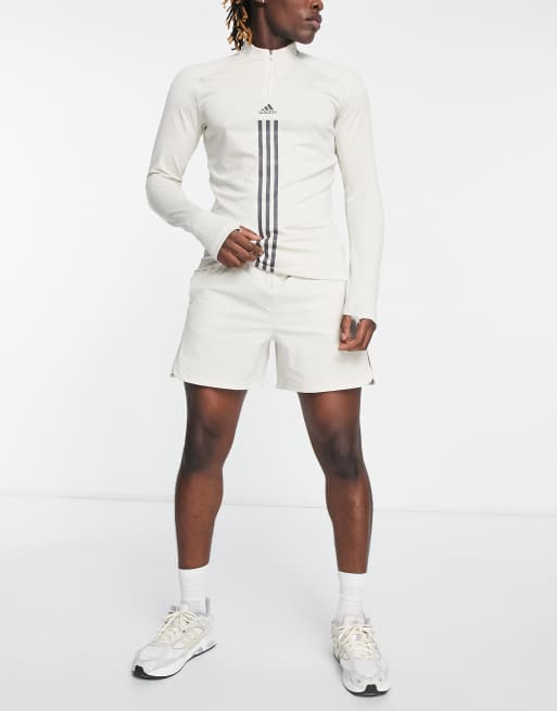 adidas Training Alpha Strength 3 stripe 1/4 zip sweat in stone | ASOS