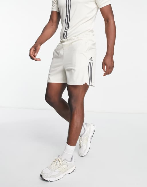 adidas Training Alpha Strength 3 stripe shorts in stone | ASOS