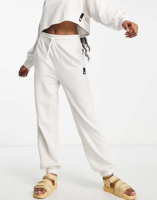 adidas Training Botanical Dye trackies in off white