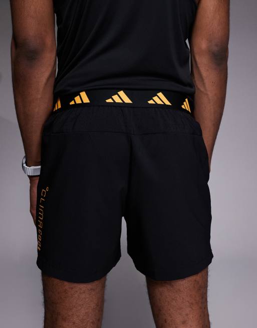 adidas Training – Climacool – Shorts in Schwarz und Orange, 4 von 5