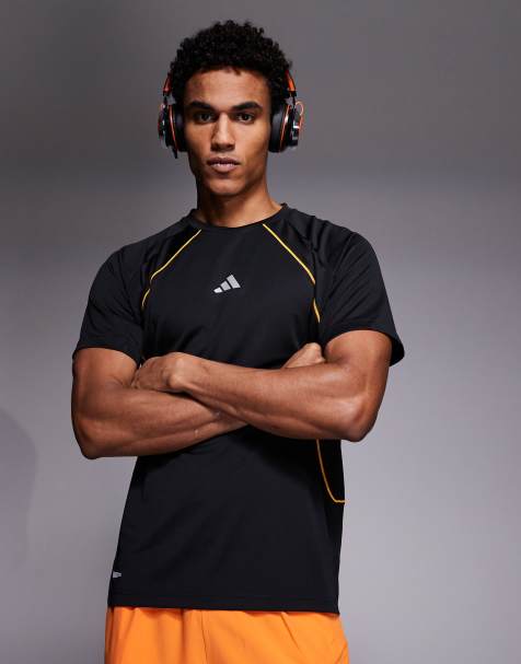 adidas - Training - Climacool - T-shirt in zwart en oranje - view 1