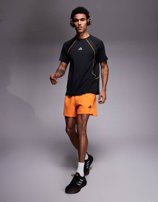 adidas - Training - Climacool - T-shirt in zwart en oranje, 2 van 5