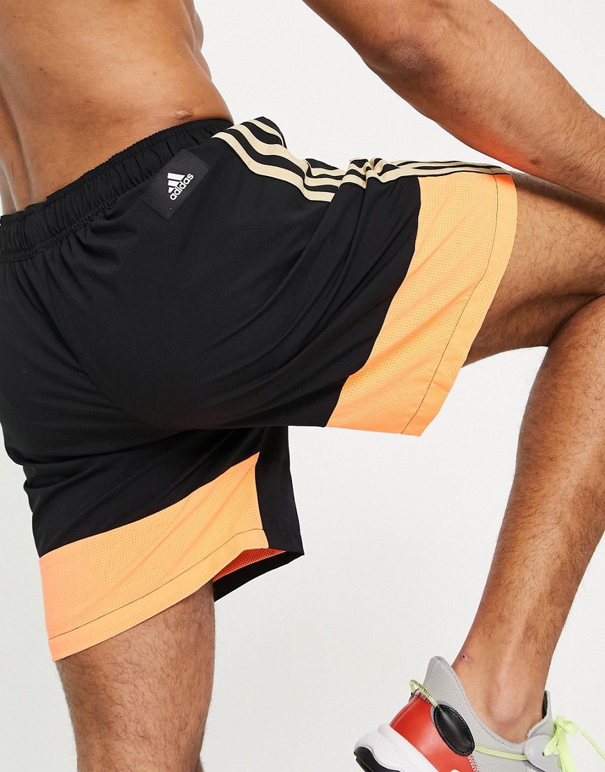 Adidas Training color block shorts in black and orange