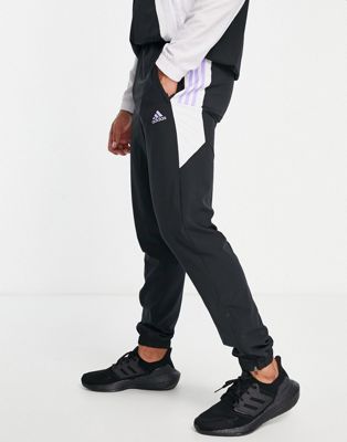 adidas Training colour block panelled trackies in black - ASOS Price Checker