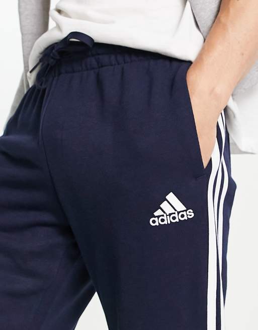 Adidas blue stripe joggers hotsell