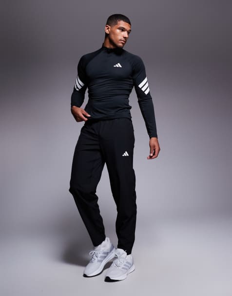 adidas - Training Essential - Geweven joggingbroek in zwart - view 1