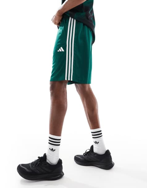 adidas Training Essentials 3 stripe shorts in dark green - view 1