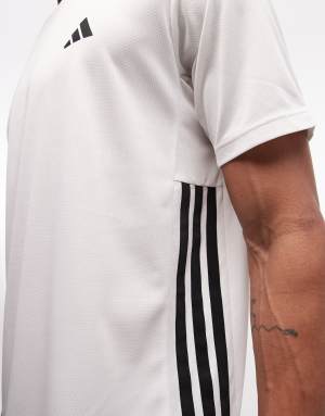 adidas Training Essentials 3 stripe t-shirt in white