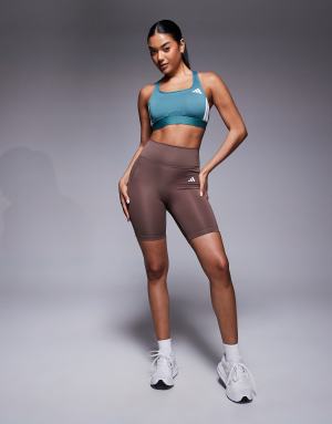 adidas Training essentials 7"" legging shorts in dark brown