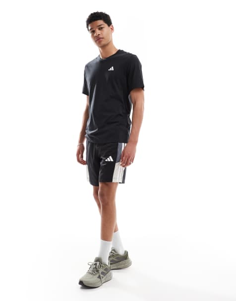 adidas Training – Essentials – Shorts mit den drei Streifen und Blockfarben-Design in Schwarz und Grau - view 1