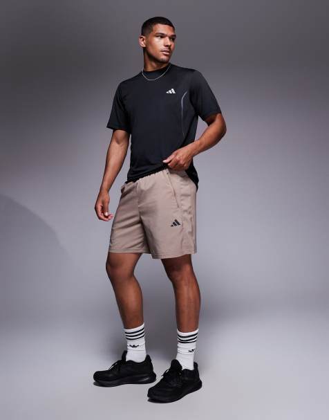adidas Training essentials woven shorts in chalky brown - view 1