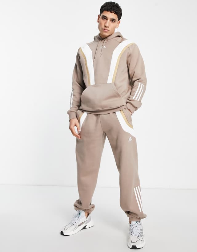 adidas Training fleece pants in brown