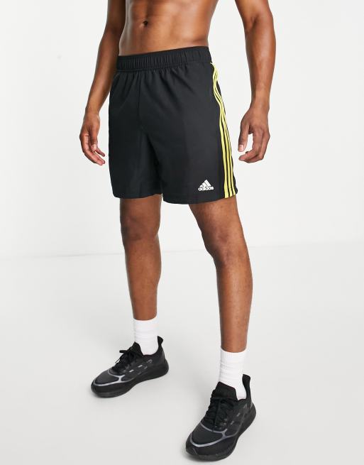 Black shorts with store yellow stripe