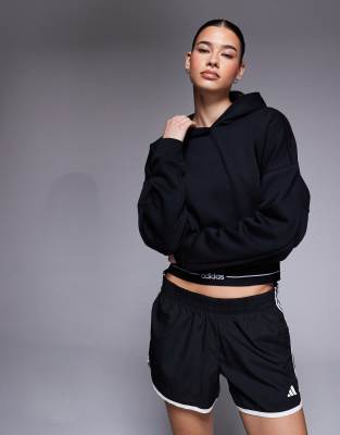 adidas Training - Hyperglam - Kapuzenpullover in Schwarz mit linearem Logo