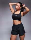 [adidas performance] adidas Training Hyperglam mid support sports bra in black XL C-D Cup Black/ white