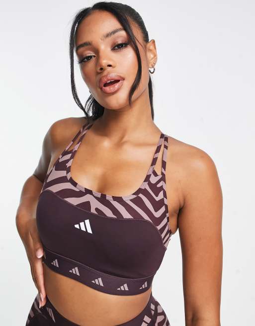 adidas Training Hyperglam panelled zebra print mid-support sports bra In  burgundy | ASOS