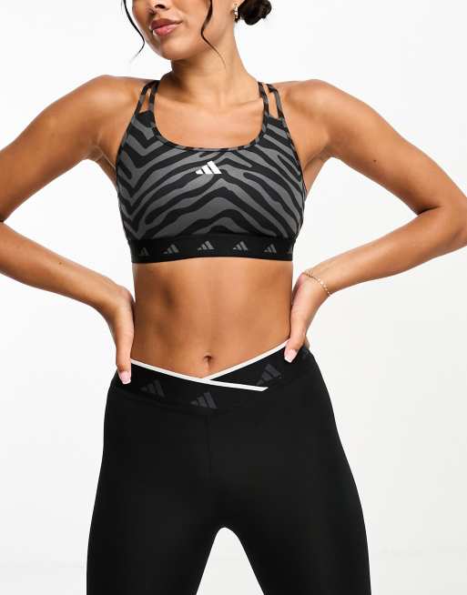 adidas Training Hyperglam zebra print mid-support sports bra in black