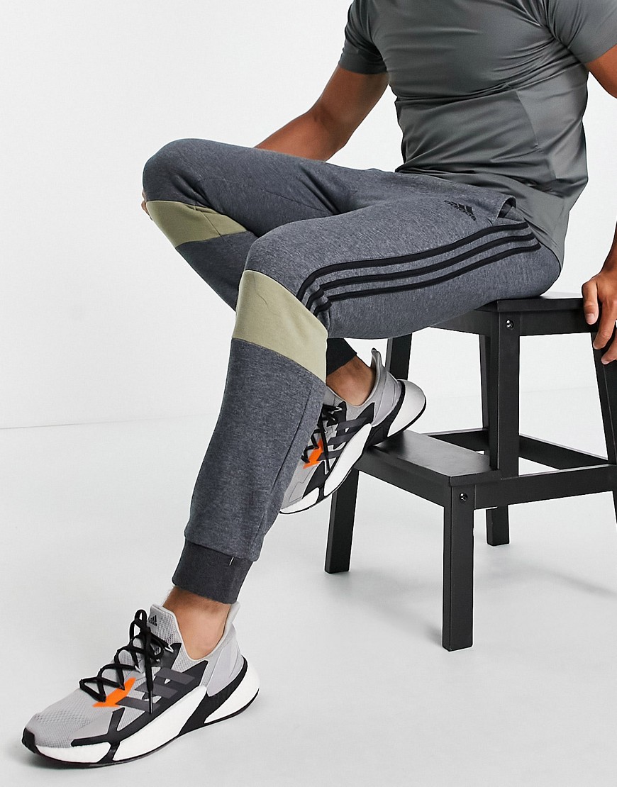 Adidas Training joggers with colourblock logo in khaki and grey