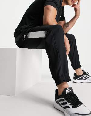adidas Training joggers with contrast panels in black