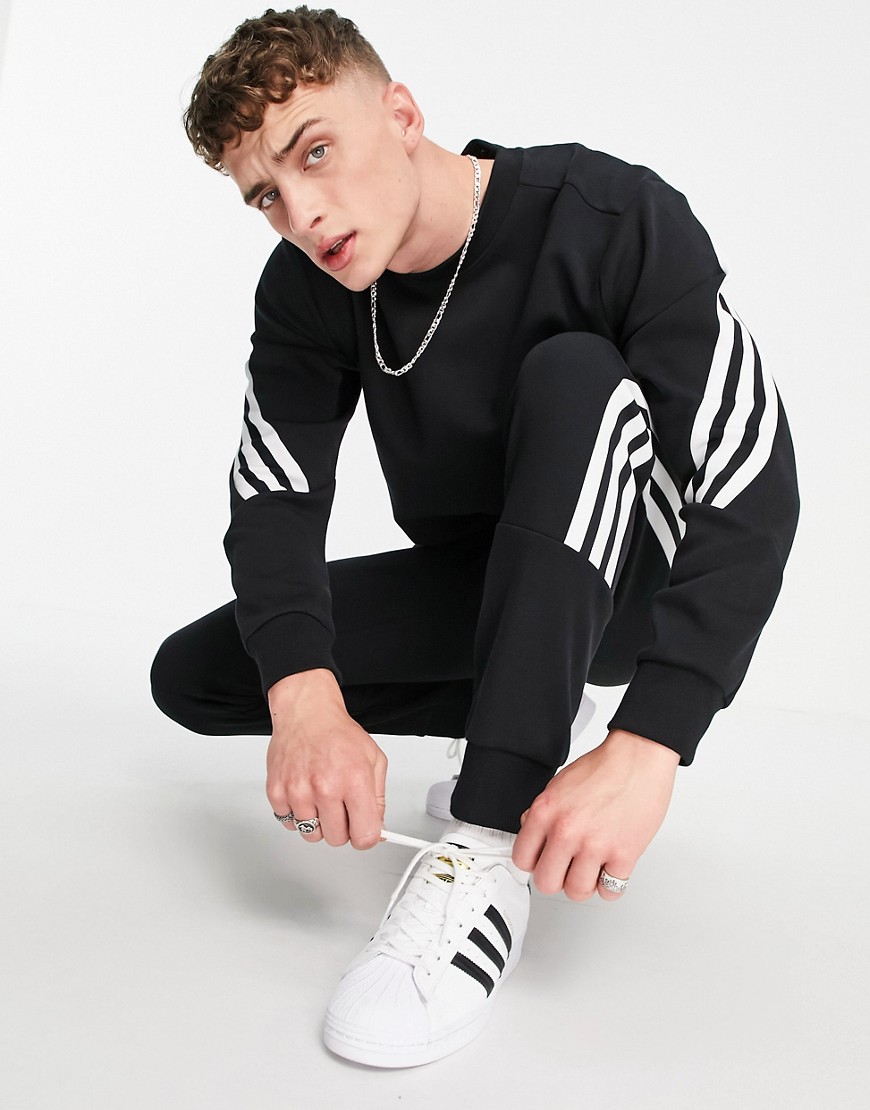 Adidas Training joggers with wrap three stripes in black