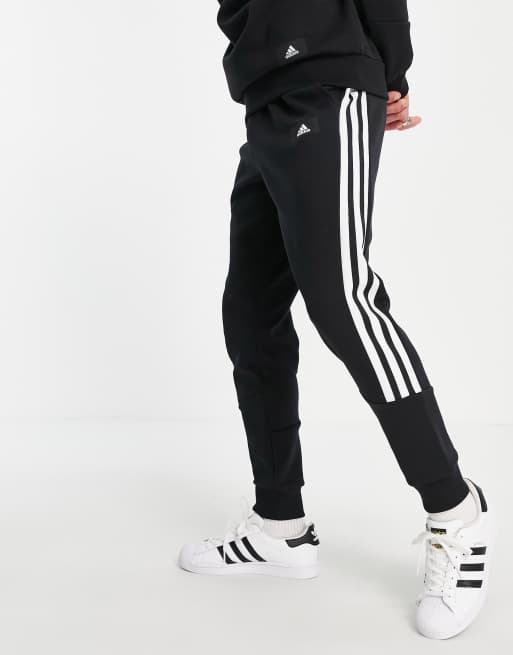 adidas Training joggers with wrap three stripes in black ASOS