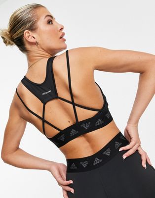 adidas Training light-support sports bra top with strap detail in black - ASOS Price Checker