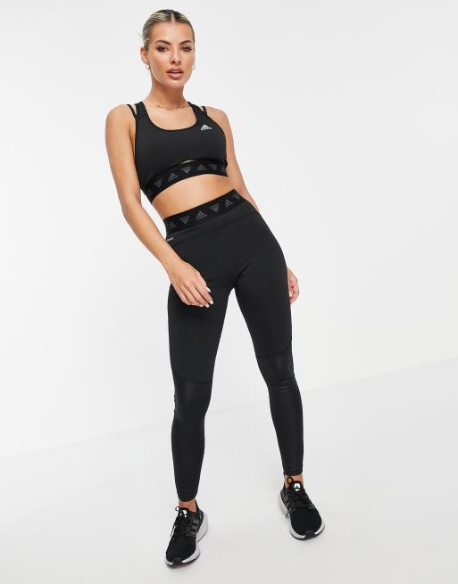 adidas Training light-support sports bra top with strap detail in black |  ASOS
