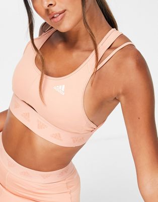 adidas Training light support sports bra with cut out detail in blush pink - ASOS Price Checker