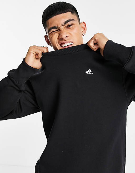 adidas Sportswear lounge sweatshirt with small logo in black