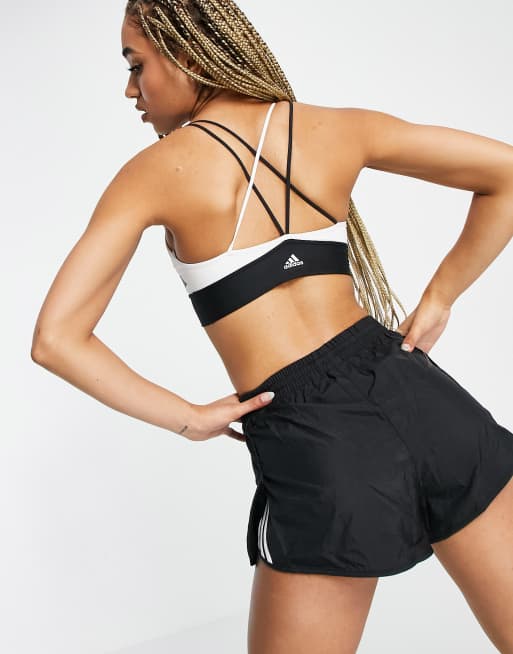 adidas Training low black & support strappy in white bra ASOS | back with