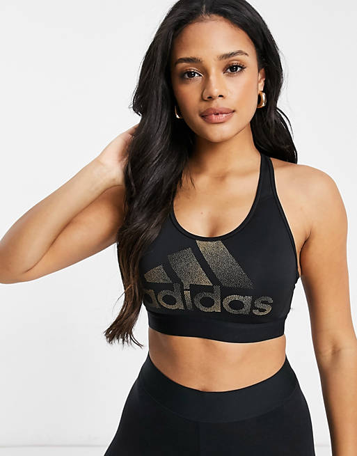 adidas Training medium support sports bra in black with rose gold logo