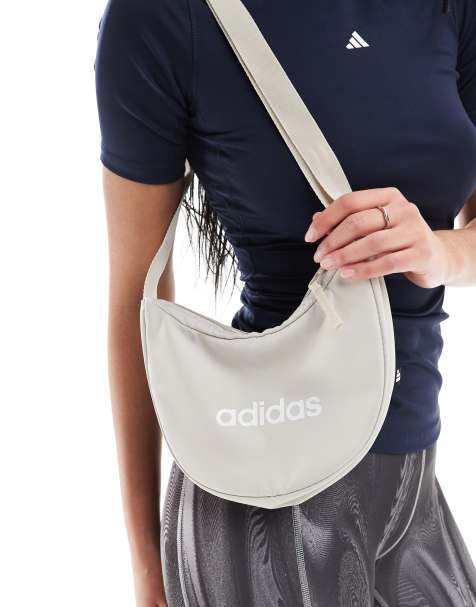 adidas Training – Nylonowa torebka crossbody w kolorze złamanej bieli - view 1
