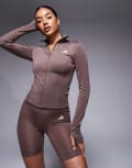 [adidas performance] adidas Training Optime essentials jacket in dark brown XS Strata