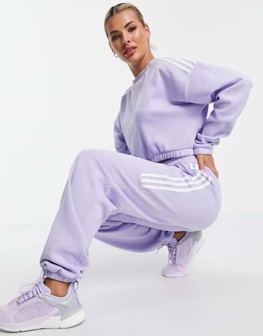 adidas Training oversized joggers with three stripes in lilac